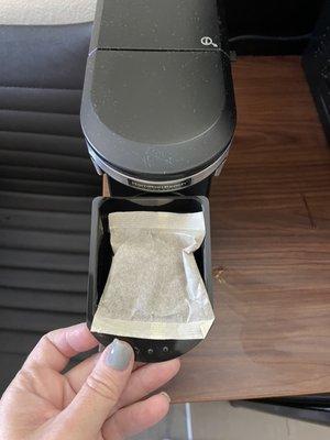 In room coffee pods too small to fit in coffee maker. Apparent just by looking at machine v pod. Obviously known to management.