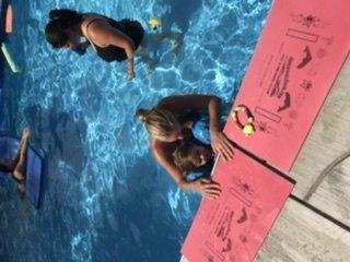 Hold on to the side of the pool for safety!