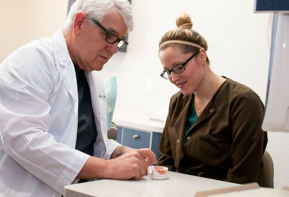 Dr. Harris prepping for a patient.