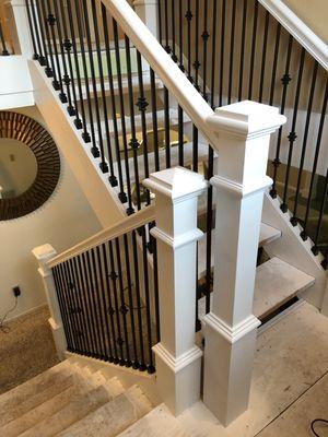 Custom hand railing with black iron balusters