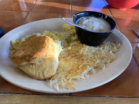 Scrambled eggs with biscuits and gravy