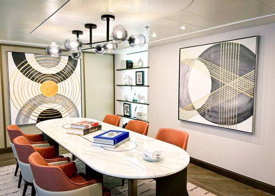 Printed, stretched, and hand embellished canvases on a cruise ship. As well as curated accessories on the shelf.