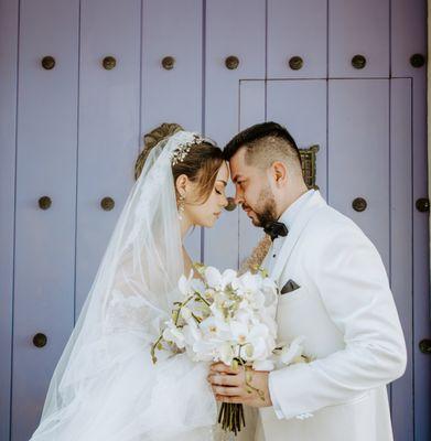 Forehead to forehead, lost in love--this Cartagena moment captures the quiet, intimate joy of just-married bliss.
