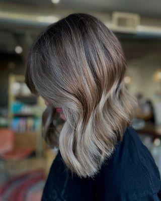 Dimensional beige blonde with a soft blend and natural finish. Book your color refresh at Studio 303 in Englewood, CO today!