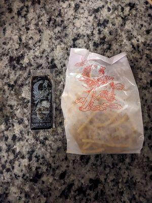 Tiny noodle.packet with soy sauce for scale.