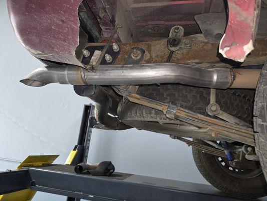 New tailpipe replacing the wrongly placed one, that OTHER shop did.