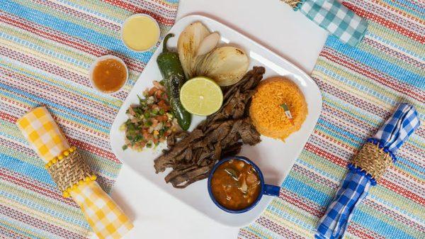 El Papa de los Pollitos Pollos Asados al Carbon