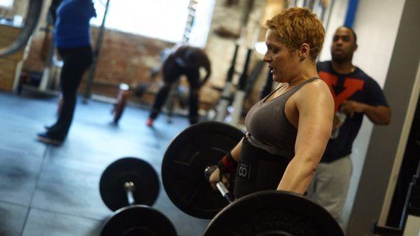 Preparing for her next set of Hang Snatches