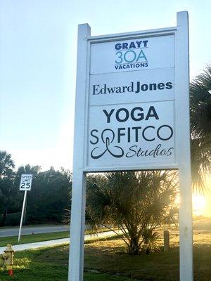 When you see the sign turn into our parking lot!