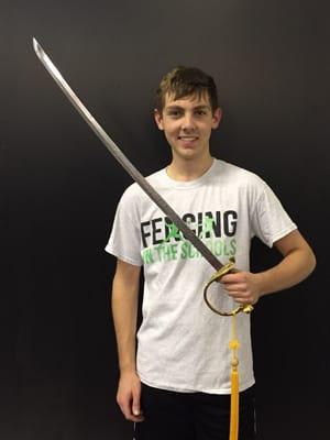 David showing off his first place trophy.