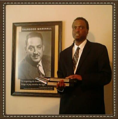 Certified paralegal Richard Harris makes sure the office runs smoothly