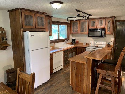 Barn Wood Kitchen Cabinets feature modern pullouts, soft close doors & drawers, etc.