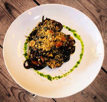 Black Spaghetti. (Garlic, capers, anchovy, olives, tomatoes, and Calabrian chili).