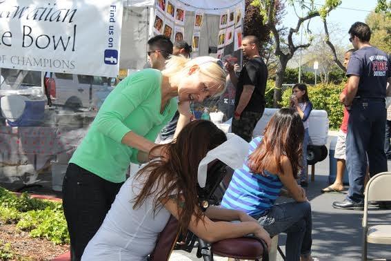 Providing chair massages at the Grand Opening of DASH (now KNOXX - martial arts & fitness).