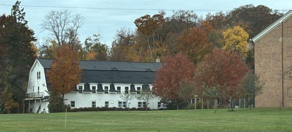 The large white building is "Pass It On" resale shop.