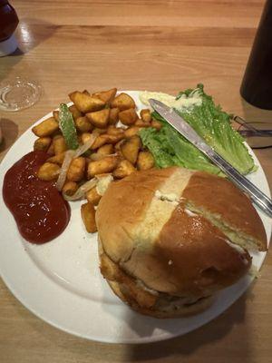 Fish sandwich made with haddock. Really good tartar sauce is great and I substitute breakfast potatoes for fries.