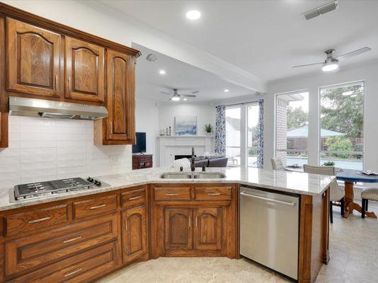 Updated "Snowland" granite countertops and white subway tile back splash