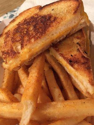 The original gorilla grilled cheese sandwich with seasoned fries. Our daughter loved it!