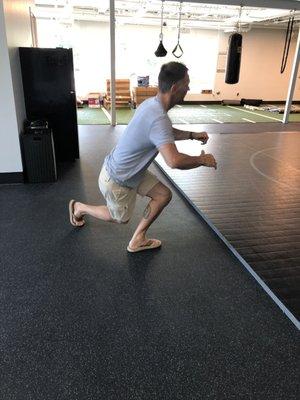 Example of backwards side lunge.
