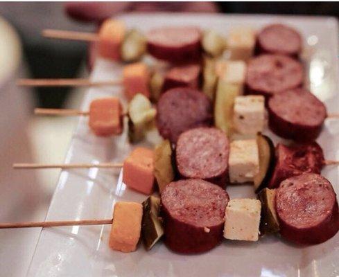 Memphis Style Sausage & Cheese Skewer with Kielbasa, Cheddar Cheese, Pepper Jack Cheese, Pickle and a sprinkle of our hog wild seasoning
