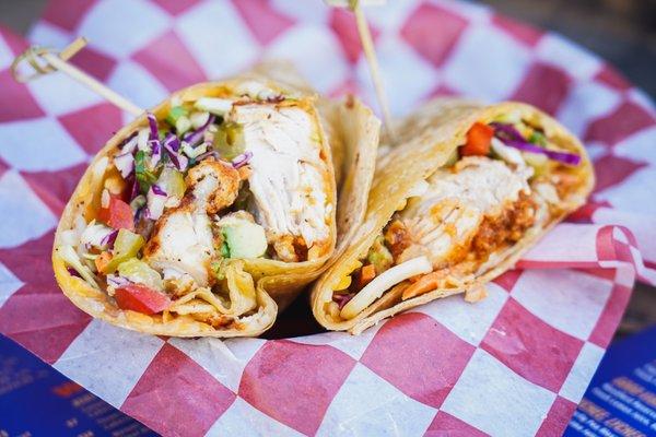 HAPPY WRAP: housemade tenders, southern slaw, pickles, steak fries, avocado, jack & cheddar cheese, buttermilk ranch, chipotle tortilla