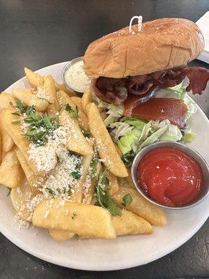 The SOFLO Burger- Swiss cheese, guava, bacon, caramelized onions, chipotle aioli & lettuce