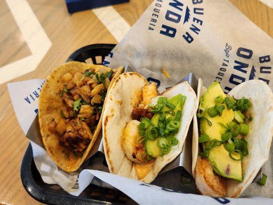 You can mix and match the kinds of tacos in your trio. Two shrimp, one al pastor