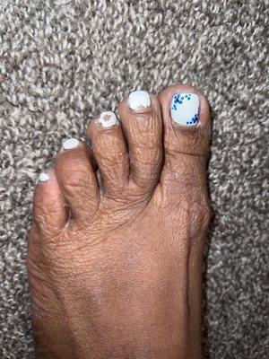 The whole paint job sucked for my feet to look this bad after 3 days from a pedicure. She didn't even get the whole toe waste of money