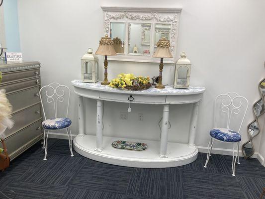 Dining room buffet, white with blue tuoile top. Center drawer with open showcase below. Very beautiful and sturdy. Measures 60 inches long,