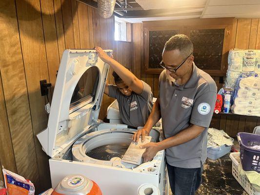 Working with my son on a Maytag washer that was out of balance