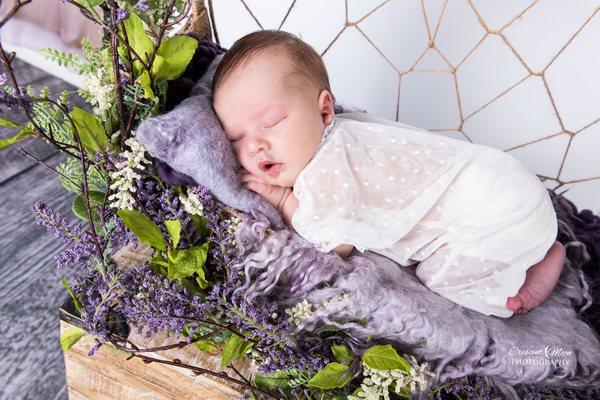 This is a beautiful baby girl sleeping in my dream catcher! I can change this into whatever colors they parents would like.