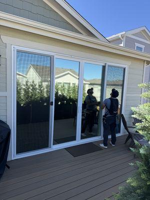 Patio windows tinted to add UV protection, glare protection, heat reduction and privacy from the neighbours