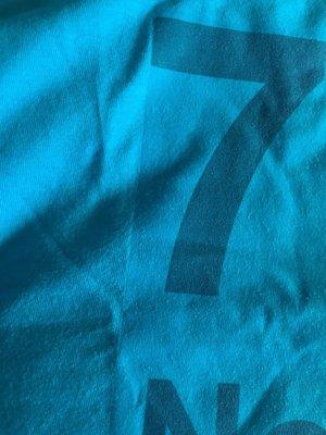 Looks like an iron on. Very bad work.