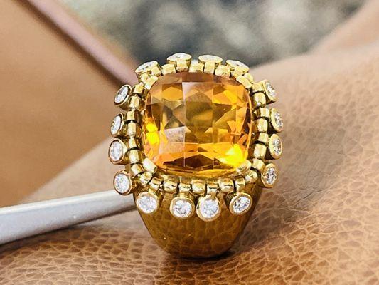 Fancy cut citrine center stone, framed by the rare and unusual movable bezel set diamonds. From the imagination of Marc Jacob Jewelers.