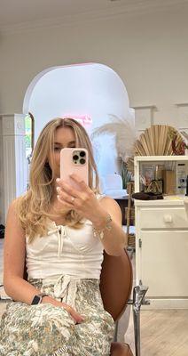 Selfie with new haircut, highlight, and layers.