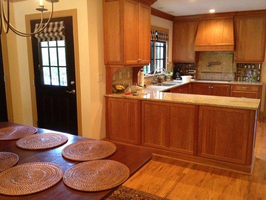 Roman shades for kitchen and door.