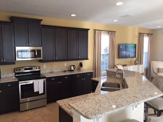 Kitchen inside model home at the Encore Club.