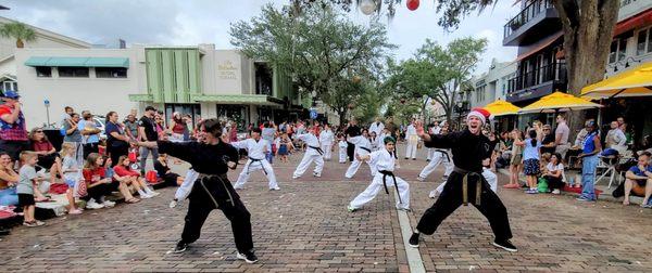 The T.U.F. Demo Team performing during the 71st Annual Winter Park Christmas Parade.