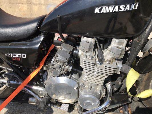 Carburetors dangling.