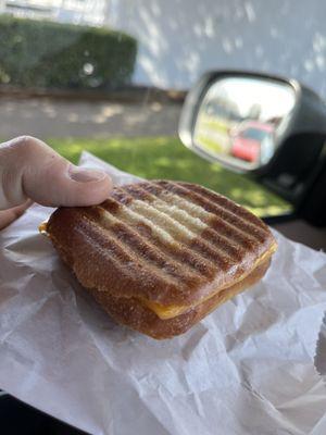 A mini panini with American Cheese