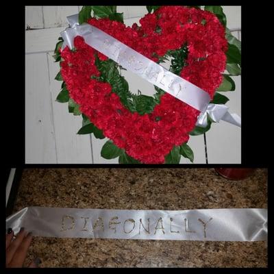 Horrible!!! We sent a message to be written on a sash, and placed diagonally across the flowers... Instead these idiots did This
