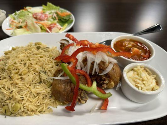 Chicken in sauce. Rice with Lima beans.