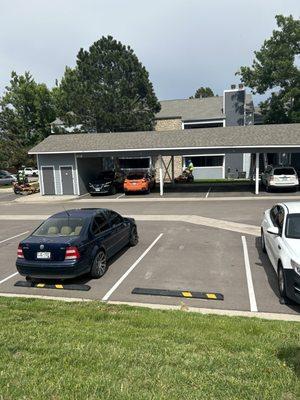 The landscapers on their phone with their boss