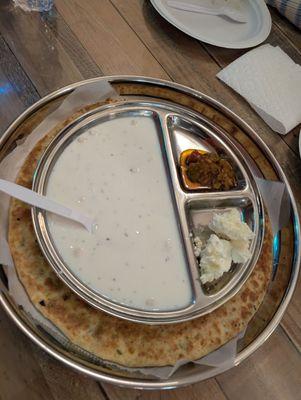 Paneer paratha with white butter