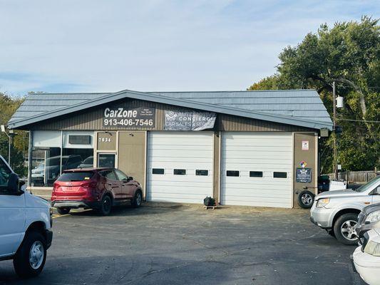 Building view from the street. Our office is hidden on the right side of the building when you come in.