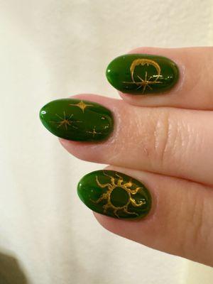 Celestial green and gold nail art