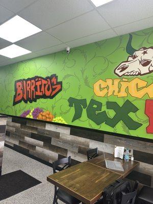 Inside seating area. Only a few tables.