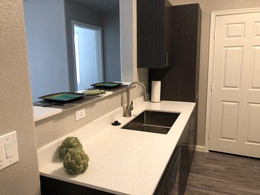 Premiums have large farm style kitchen sink.