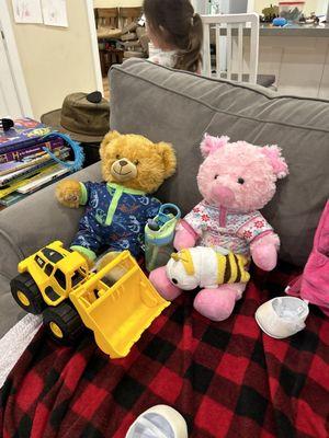 Classic bear and pinky pig having movie night in their new jammies