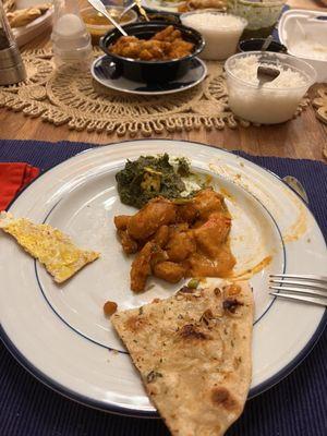 Baby corn Manchurian, Palak paneer, Butter chicken masala, Garlic naan